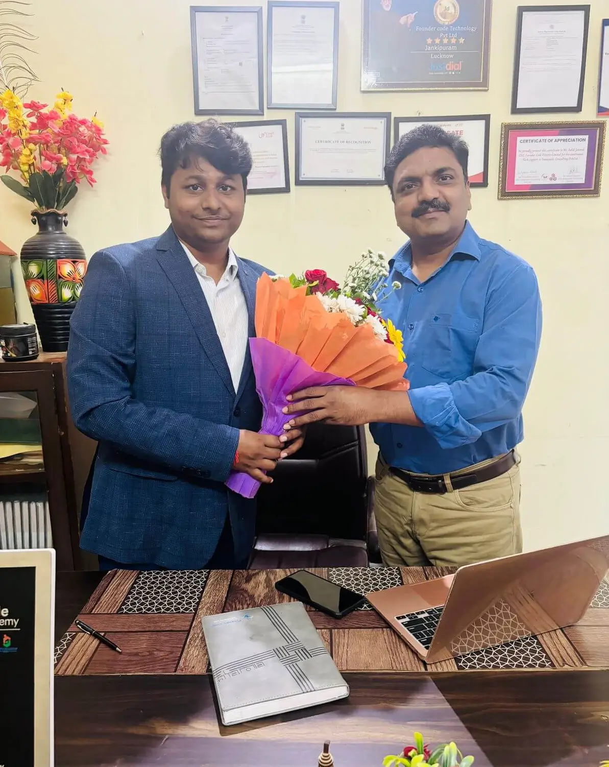 Founder, Co-founder, and team celebrating a successful milestone