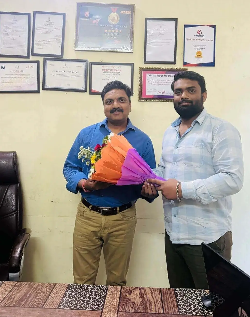 Mentor and Co-founder sharing a happy memory